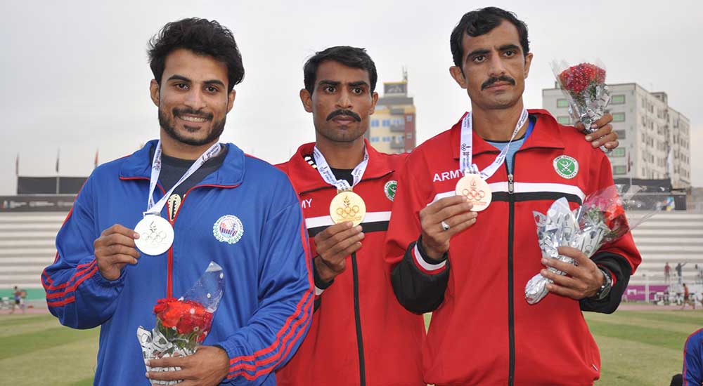 Winning athlete and Gold medalists Murad Ahmad and Murad Ali flaunt their wins.